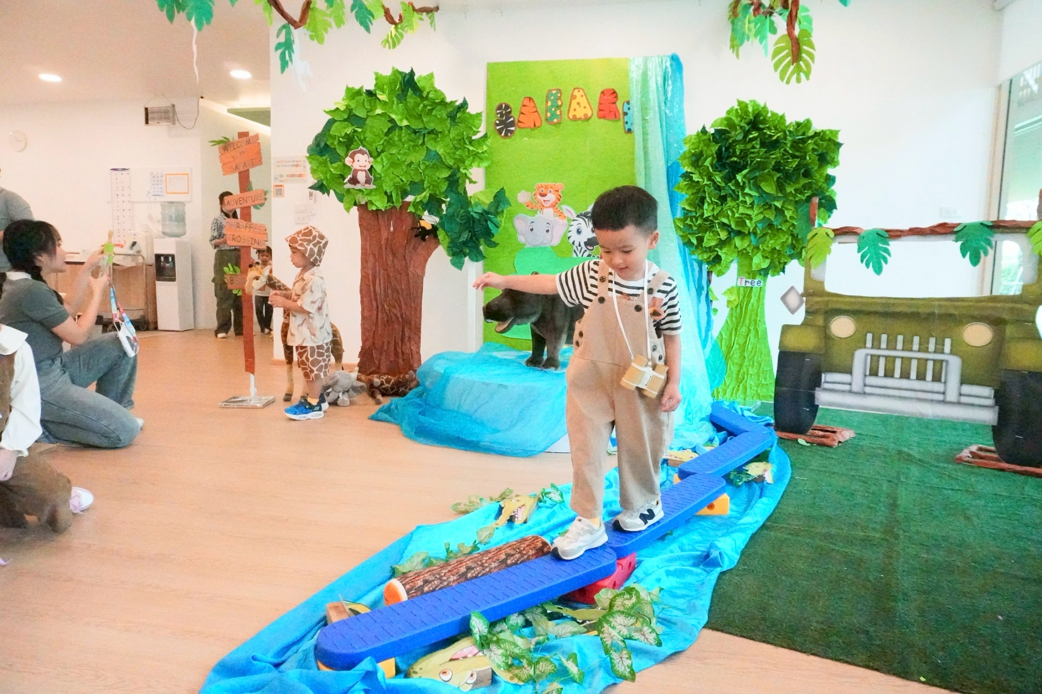Children in costumes celebrating Jungle Day at Anvida School